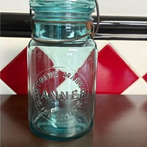 1910’s Banner Blue Glass wide mouth quart